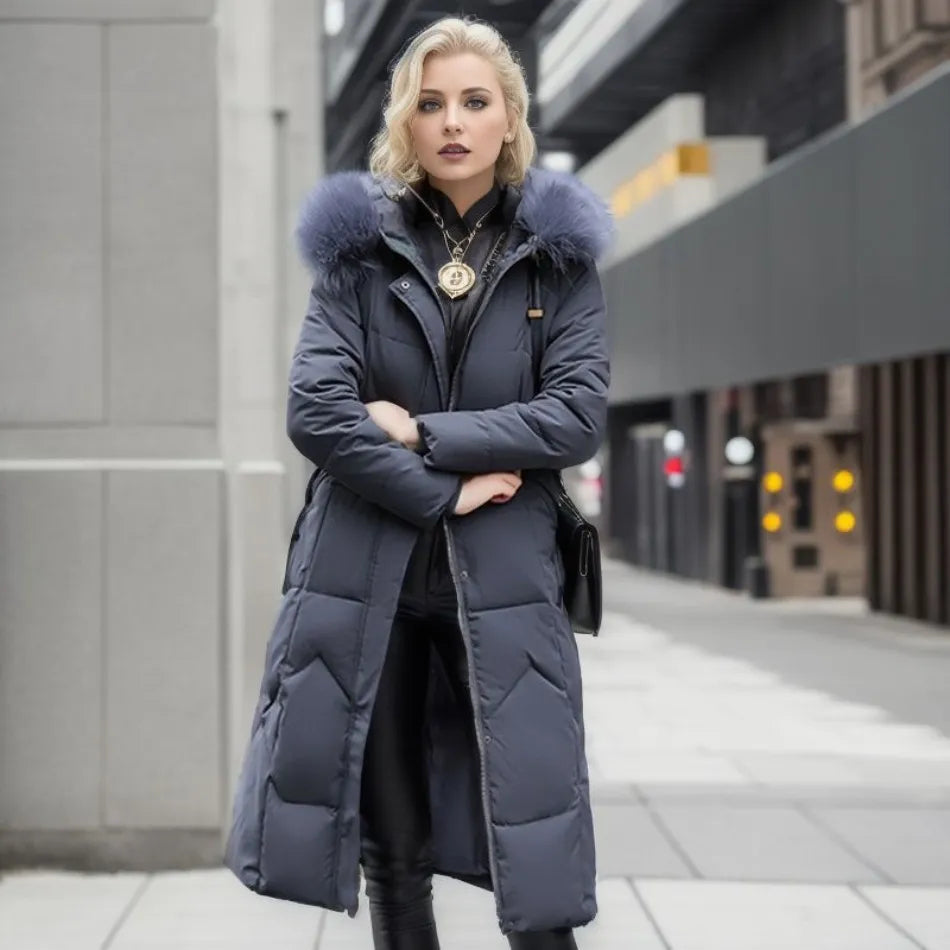 Model walking in a long hooded winter parka with fluffy trim, showcasing flexibility and comfortable fit for cold days.