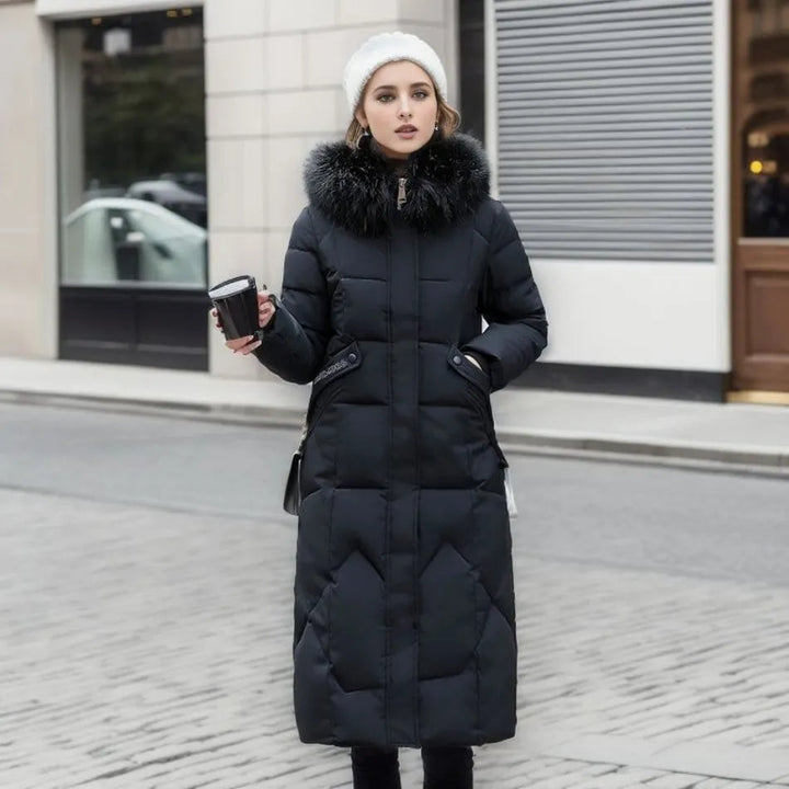 Side view of a long hooded winter parka, showcasing its extended length, fluffy trim, and durable construction.