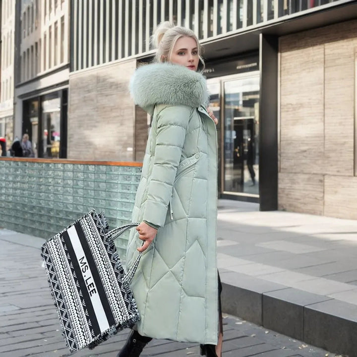Back view of a warm unisex long winter parka, highlighting the spacious hood with its soft, fluffy trim.