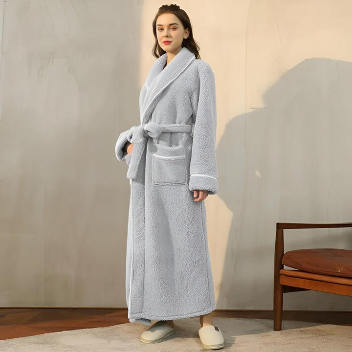 Soft unisex fleece bathrobe, shawl collar for cozy comfort & daily loungewear relaxation.