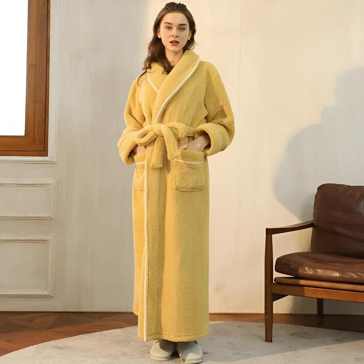 Wrap yourself in relaxation with this soft unisex fleece shawl collar bathrobe, perfect for home.