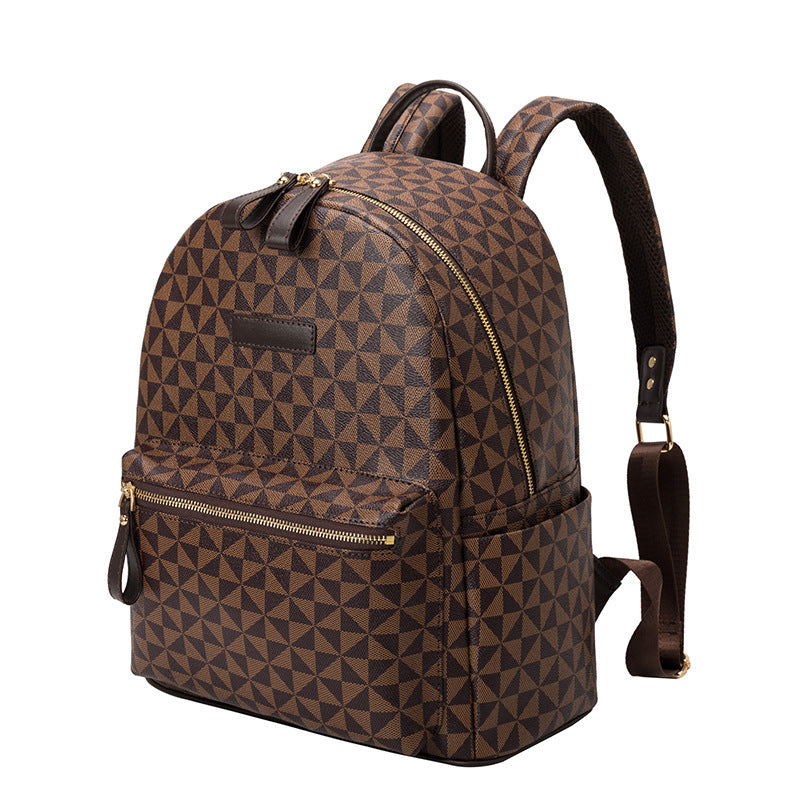 Unisex geometric backpack worn for daily use, ideal for urban commutes and travel.