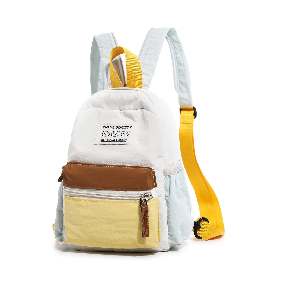 Student wearing a stylish black multi-compartment casual backpack, perfect for school, travel, and everyday organized carry.