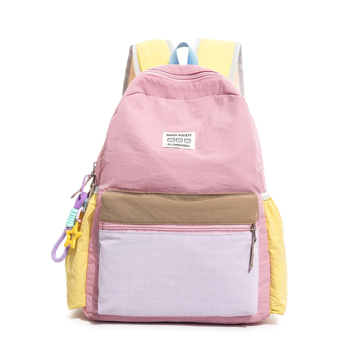 Close-up of the durable fabric and sturdy zippers on a multi-compartment unisex school backpack, built for daily use.