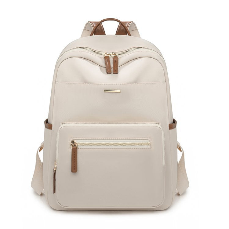 Stylish unisex travel backpack worn by a traveler, perfect for campus, commuting & organized trips.