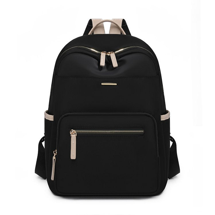 Functional multi-pocket backpack showing front organizer panel for pens, phone, and small travel items.
