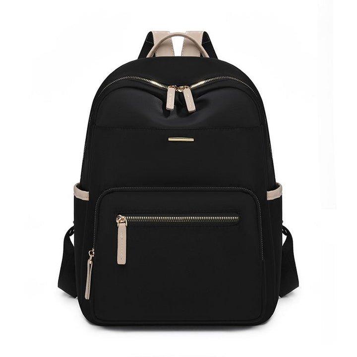 Functional multi-pocket backpack showing front organizer panel for pens, phone, and small travel items.