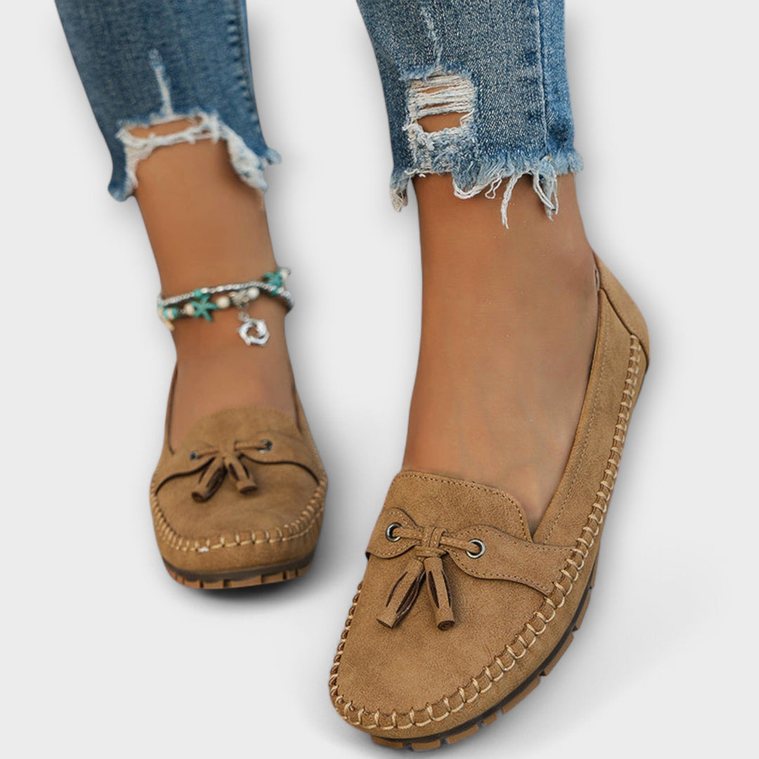 Premium orthopaedic loafers for men & women. Features enhanced arch support, comfortable fit, and slip-on style.