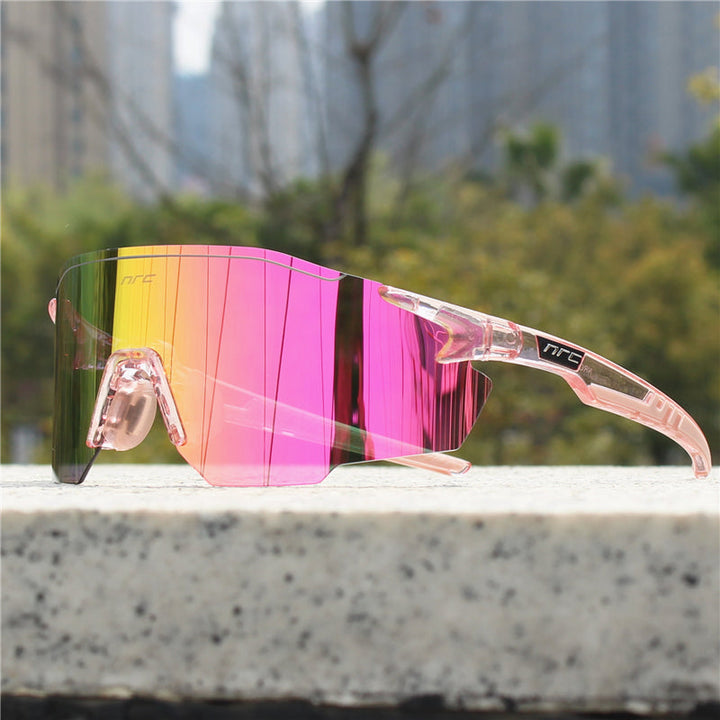 Durable unisex polarized sports sunglasses with UV protection. Ideal for outdoor activities like running & cycling.