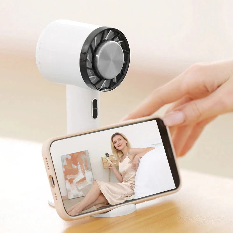 Outdoor portable fan, compact & rechargeable, perfect personal cooler for travel.