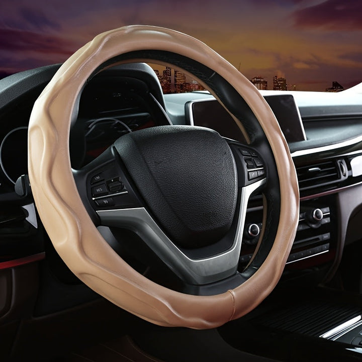 Soft PU leather steering wheel cover for superior grip and a comfortable driving experience.