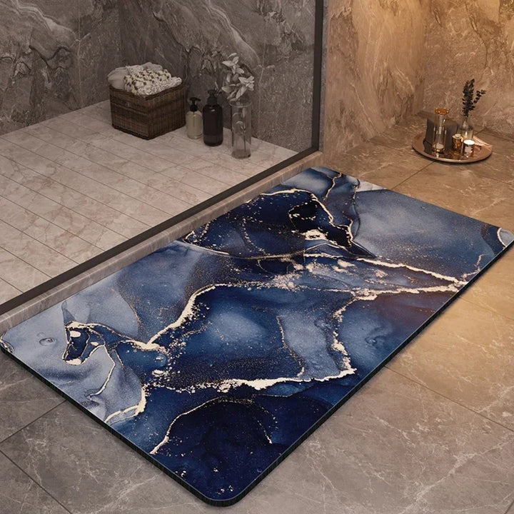 No more wet floors! Quick-drying anti-slip bath mat for bathroom safety. Absorbent & comfortable shower mat.