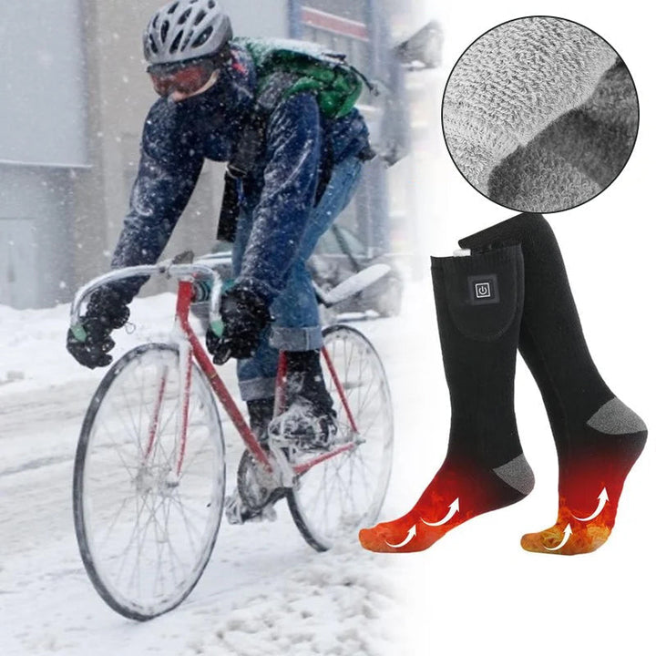 Keep feet warm on slopes with HeatWave rechargeable heated skiing socks.