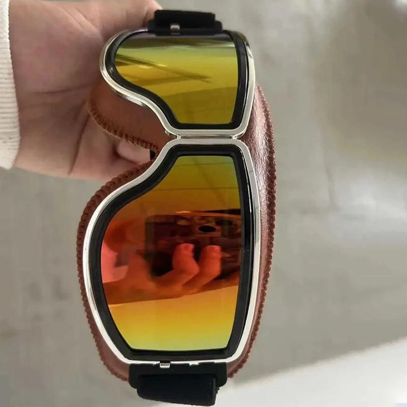 Protective retro aviator riding goggles, foldable for motorcycle, skiing, and cycling.