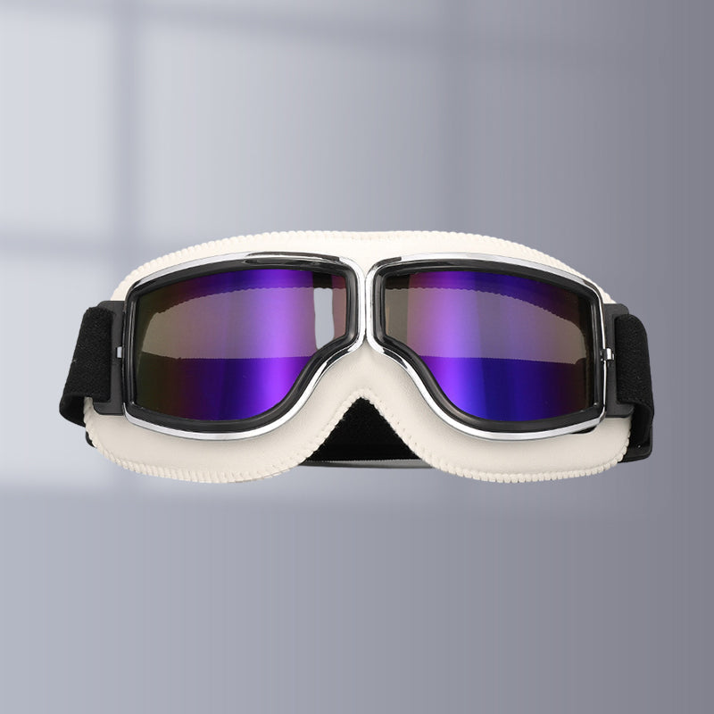 Vintage motorcycle goggles, foldable aviator style, over-glasses fit for outdoor adventure.