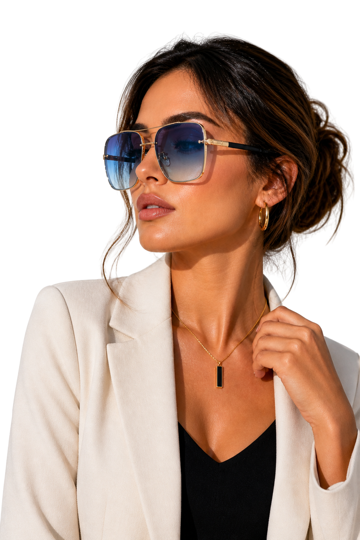 Unisex aviator eyewear: gold frame, retro design, UV400 gradient lenses for sun protection.