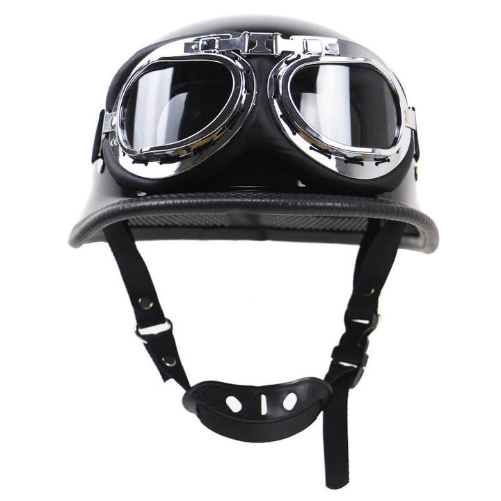 Durable unisex half-helmet for motorcycles, paired with clear lens protective goggles for road riding.