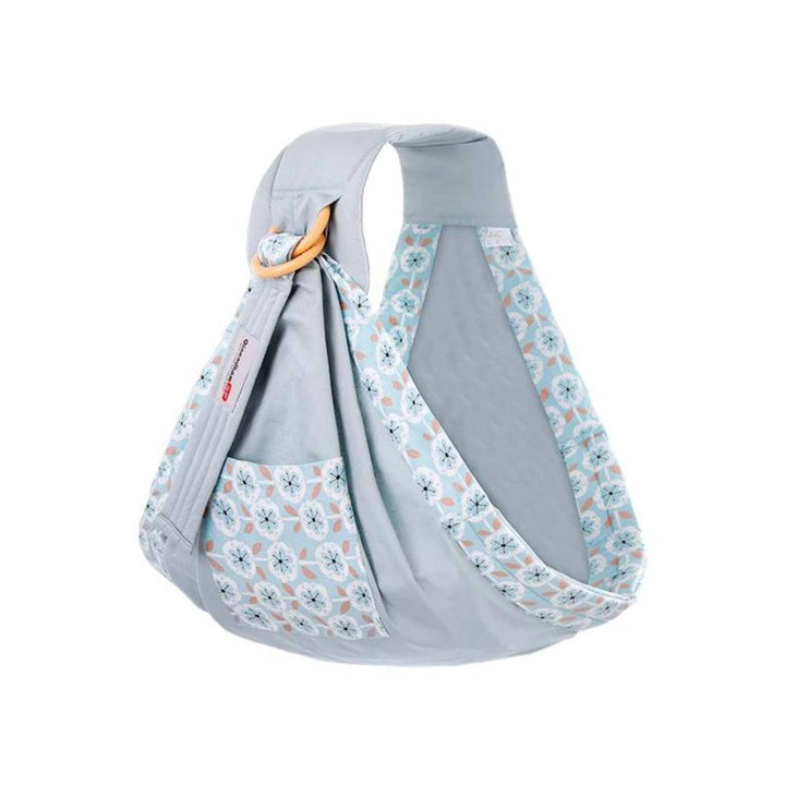 Newborn baby carrier and nursing cover in a comfortable cotton blend wrap.