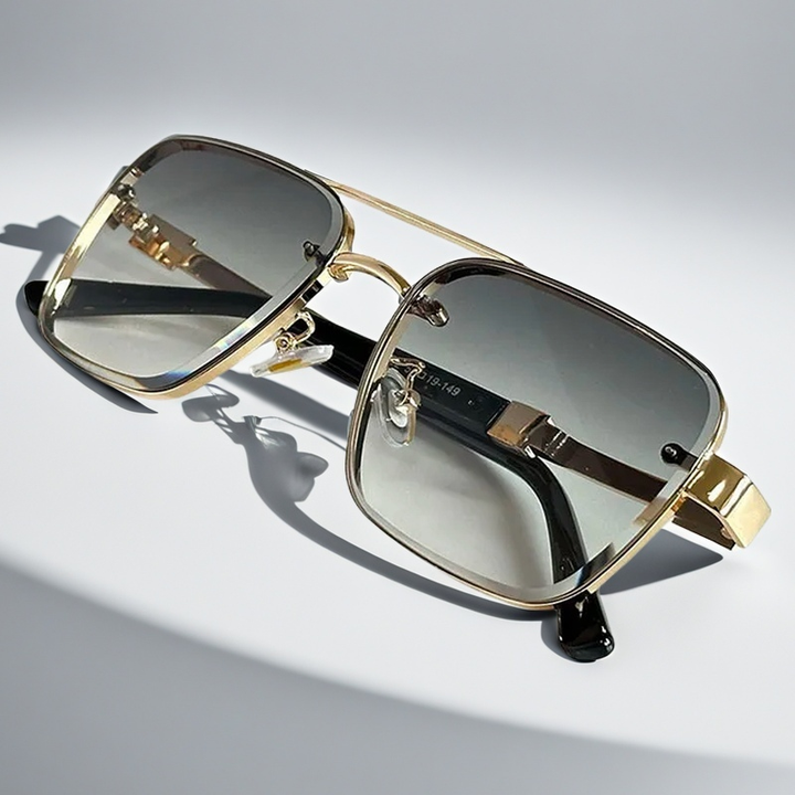 Modern squared frame sunglasses for men & women, featuring gradient lenses & UV protection.