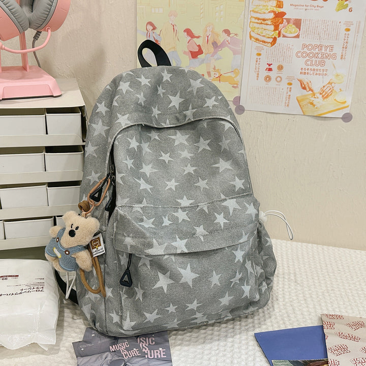 Front view of a star pattern backpack, showing detailed stitching and spacious main compartment for everyday use.