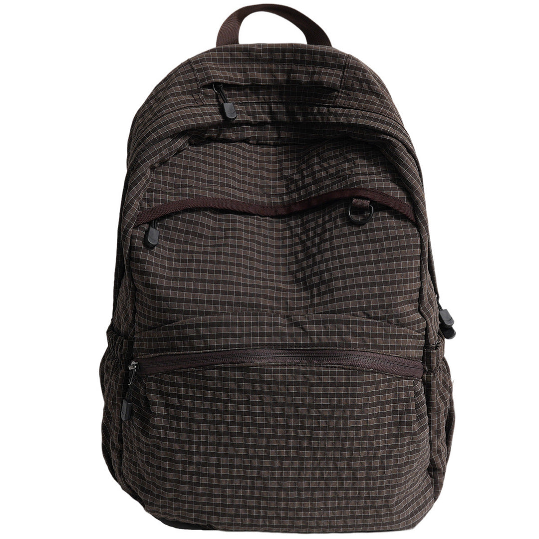 Unisex structured school backpack in black, featuring multiple compartments for daily carry, laptop, and books.