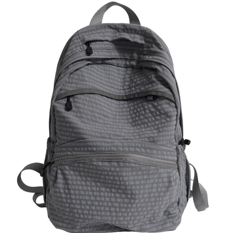 Durable unisex multi-functional backpack, ideal for school, travel, or work, with spacious design & sturdy build.