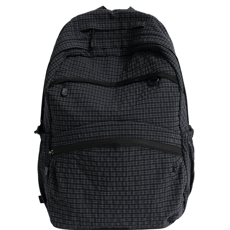 Sleek grey structured laptop bag for students & professionals, perfect as a versatile daily carry or travel backpack.