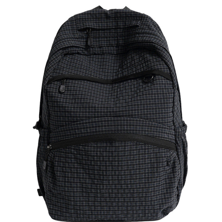 Sleek grey structured laptop bag for students & professionals, perfect as a versatile daily carry or travel backpack.