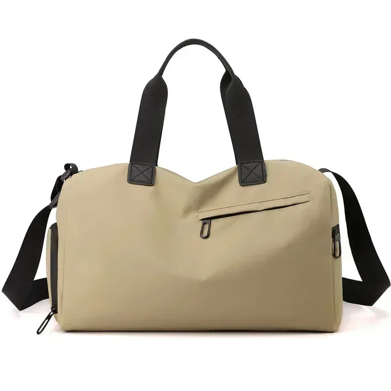 Durable unisex duffle bag for gym & work travel. Features separate compartments & carry-on size. Black.