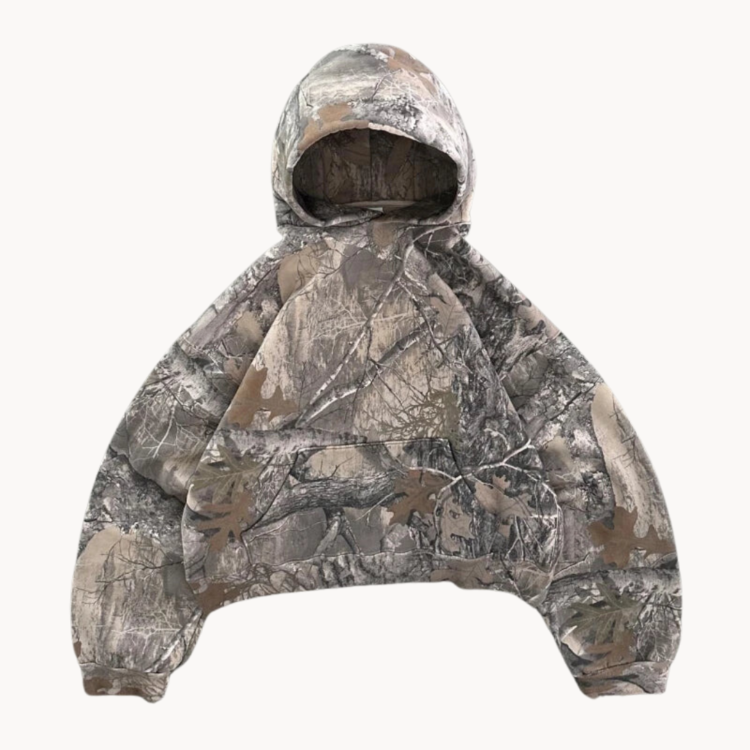 Unisex urban camo oversized hoodie, perfect for a relaxed streetwear style. Comfortable camouflage top for modern fashion.