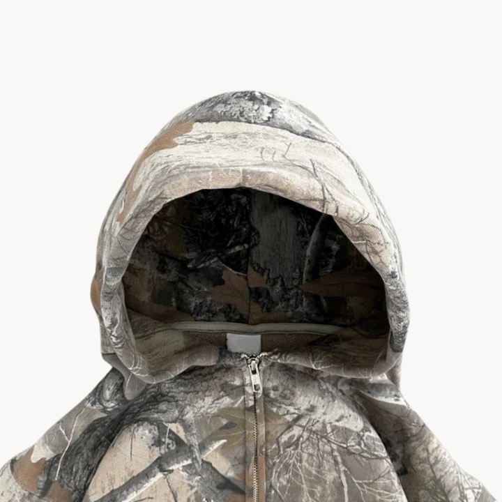 Comfortable unisex camouflage pullover hoodie with a relaxed fit, perfect for everyday urban streetwear fashion.