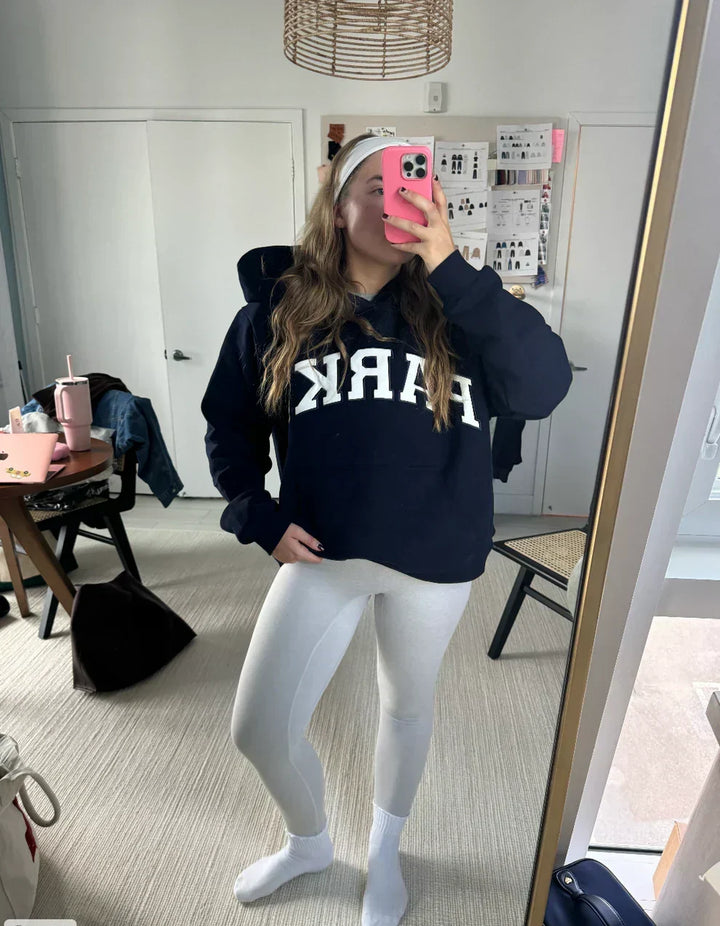 Street-ready varsity sweatshirt, unisex oversized fit & bold chenille lettering.