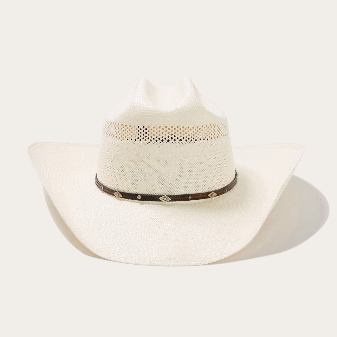Unisex ventilated cowboy hat with genuine leather band & stylish silver accents for sun protection.