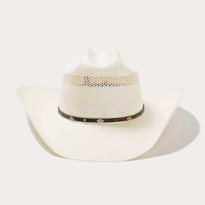 Unisex ventilated cowboy hat with genuine leather band & stylish silver accents for sun protection.