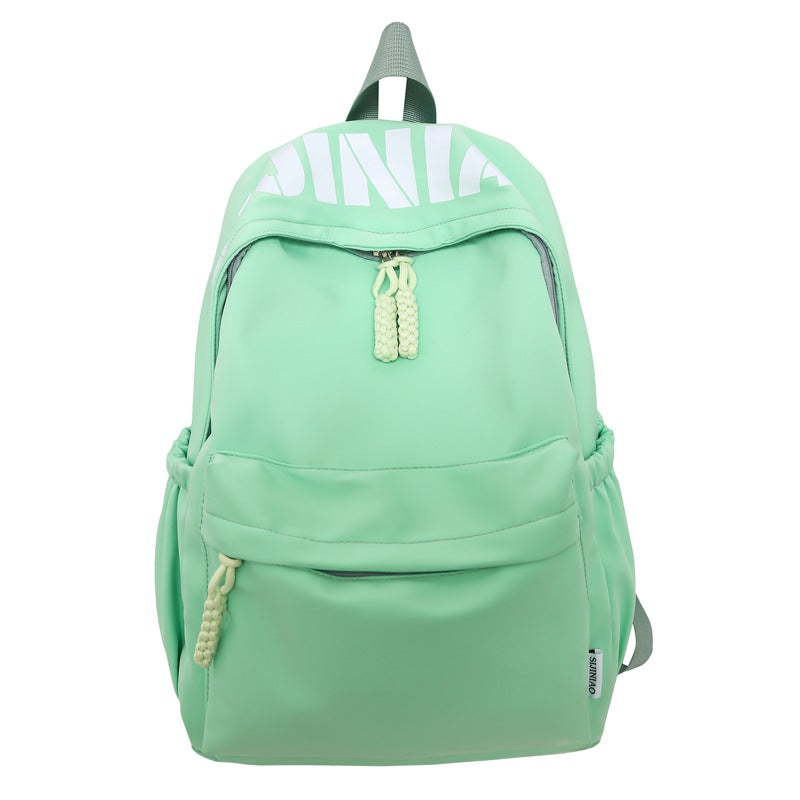 Front view of a black durable unisex school backpack, perfect for daily commute, travel, and student essentials.