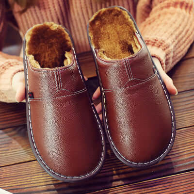 All-weather unisex waterproof slippers ensure dry feet and cozy comfort for indoor & outdoor use. Ideal house shoes.