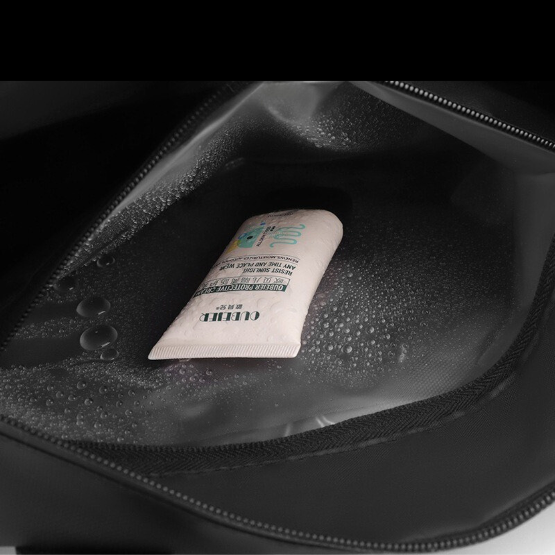 Black waterproof sports bag featuring a side shoe compartment, great for the gym, travel, or athletic gear.