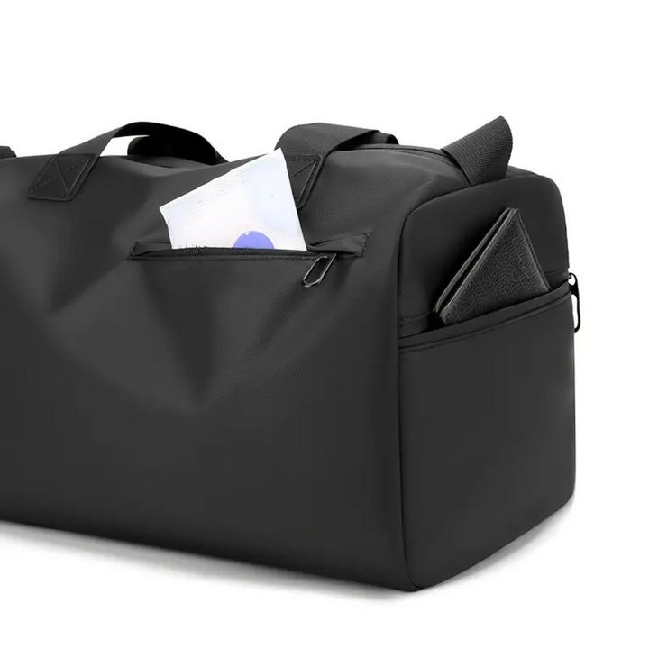 Spacious workout bag with a waterproof design and a dedicated shoe compartment for clean storage.