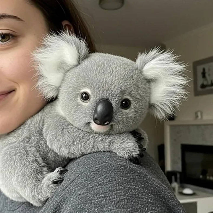 Weighted koala cuddle toy. Soft plush material for comfort & stress relief, ideal for all ages.