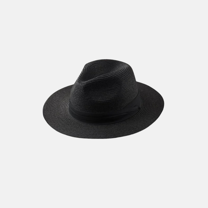Unisex wide brim straw sun hat, perfect for summer beach days & travel. Breathable paper straw for ultimate protection.