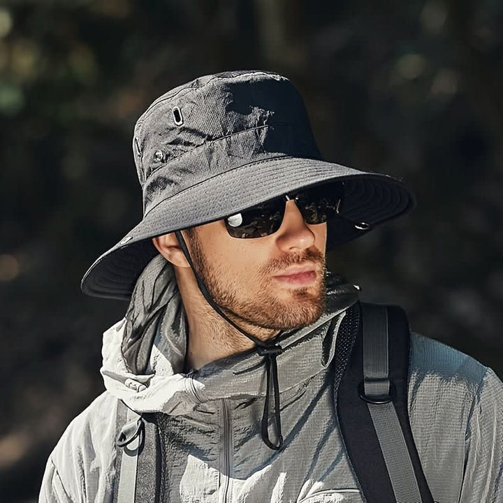 Unisex wide brim sun hat with ventilated mesh & adjustable chin strap, ideal for hiking, fishing & outdoor adventures.