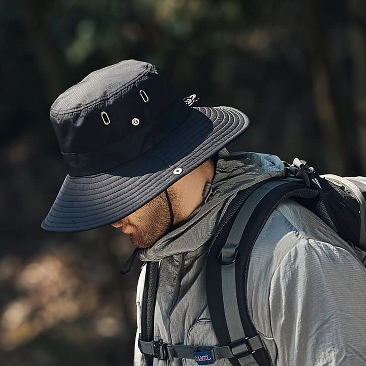 Ventilated wide brim sun hat for ultimate UV protection. Features an adjustable chin strap for secure outdoor wear.