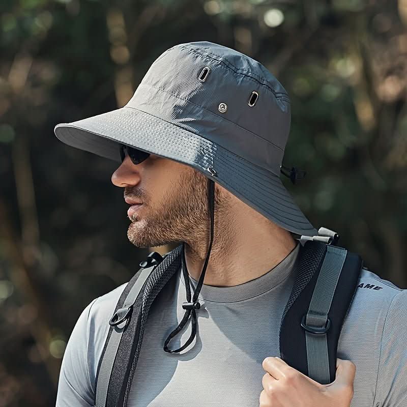 Unisex wide brim outdoor hat with adjustable chin strap and breathable mesh, offering excellent sun protection for summer.