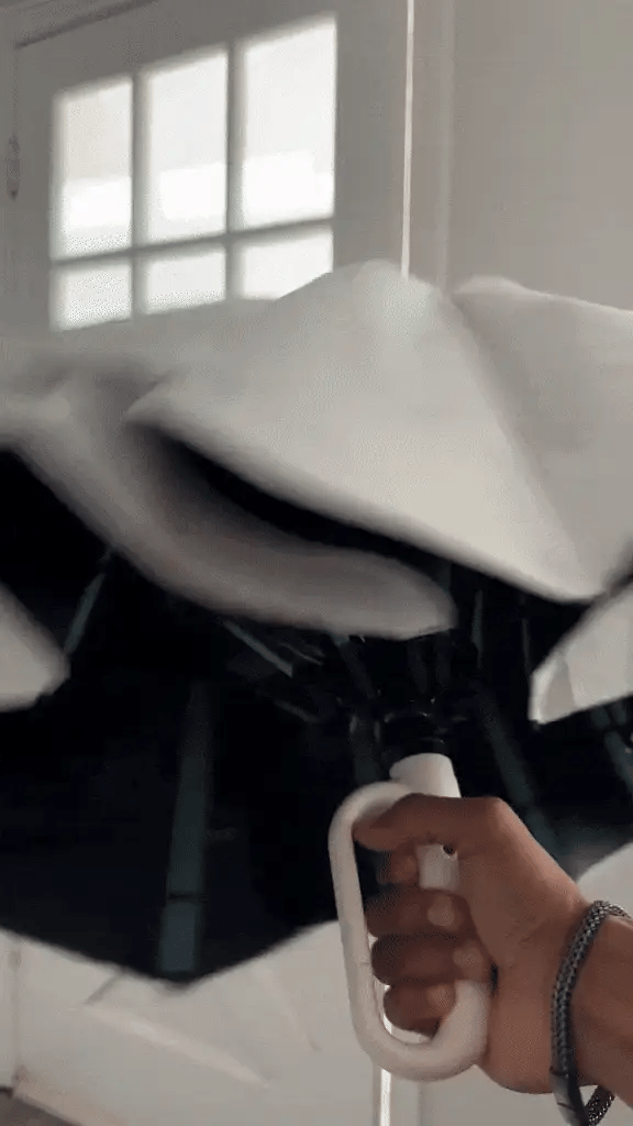 Robust windproof automatic folding travel umbrella, built for harsh weather & strong winds. Durable.