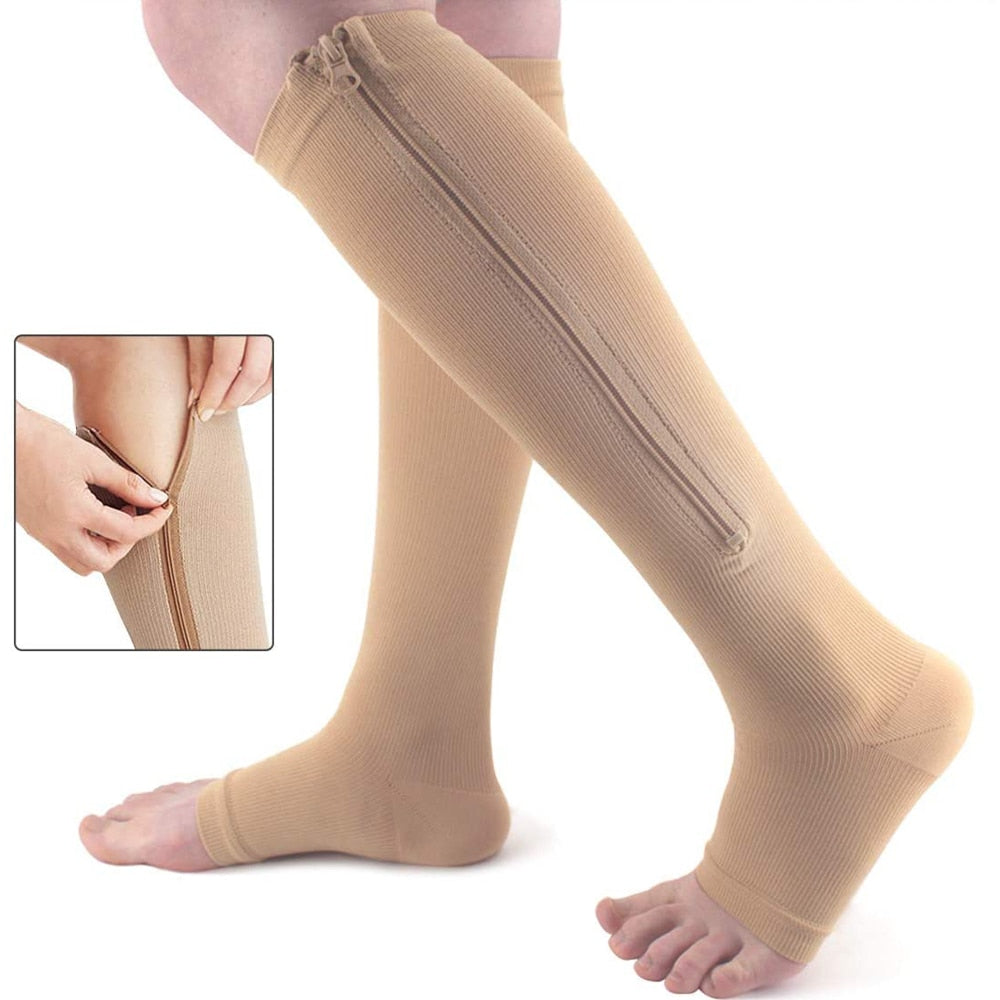 Unisex zipper compression stockings for easy leg relief, support, and swelling reduction. Perfect for tired legs.