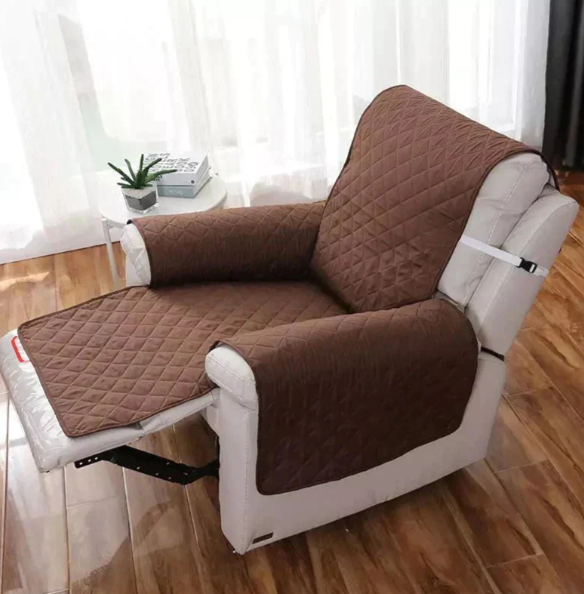 Enhance your living room with a soft, quilted recliner cover. Universal fit for comfort & protection.