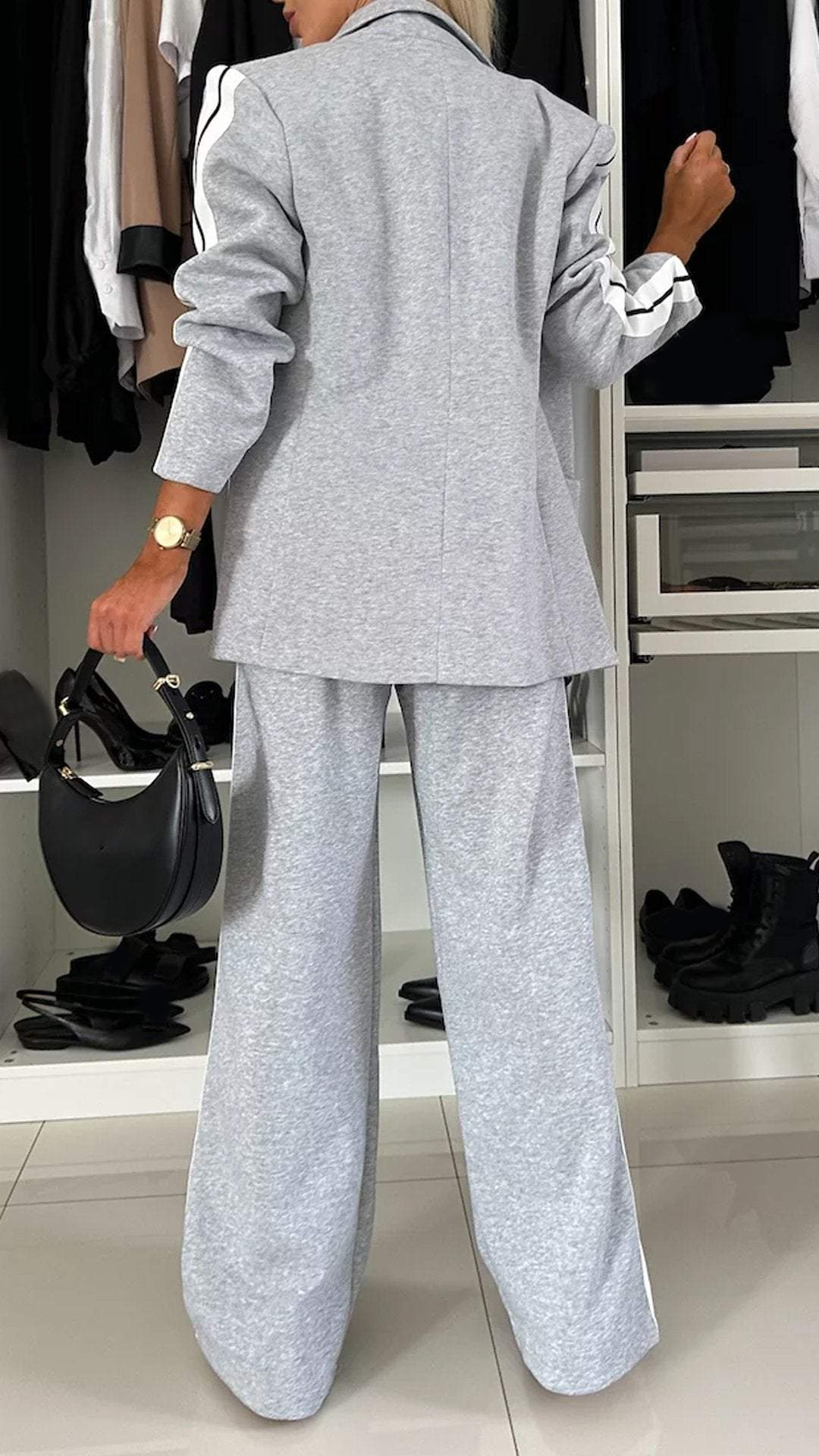 Stylish women's leisure wear: the Urban Luxe two-piece suit set in action.