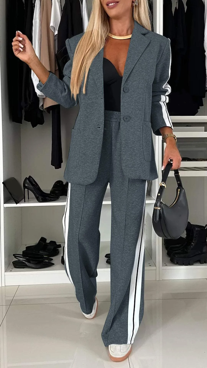 Close-up of the fabric and sporty stripe detail on the Urban Luxe women's suit.