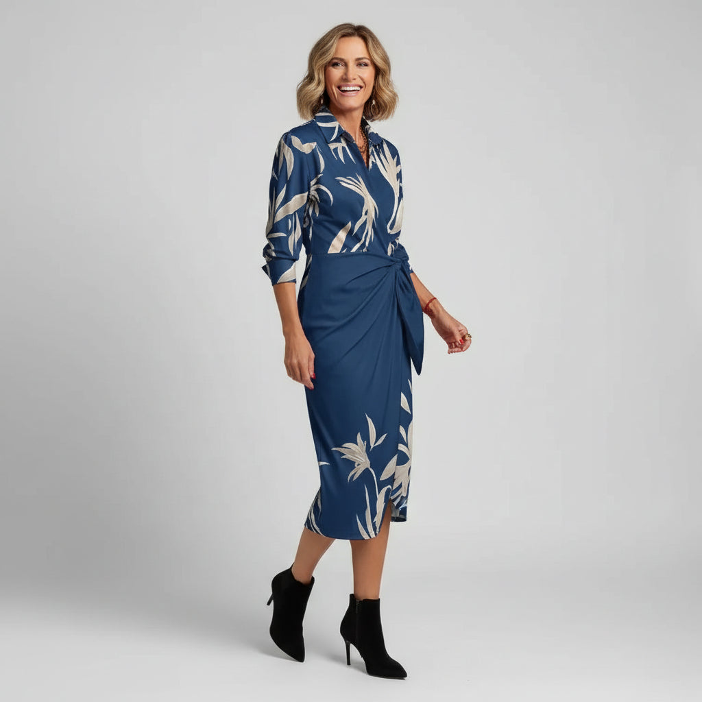 Stylish women's summer midi dress in a vibrant print, ideal for everyday occasions.