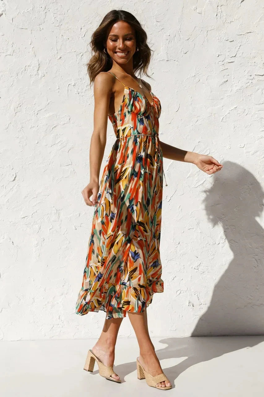 Elegant women's colorful abstract print midi dress, v-neck sleeveless, ideal for stylish summer events & casual.